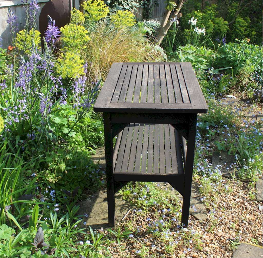 Teak garden table by Hughes Bolckow