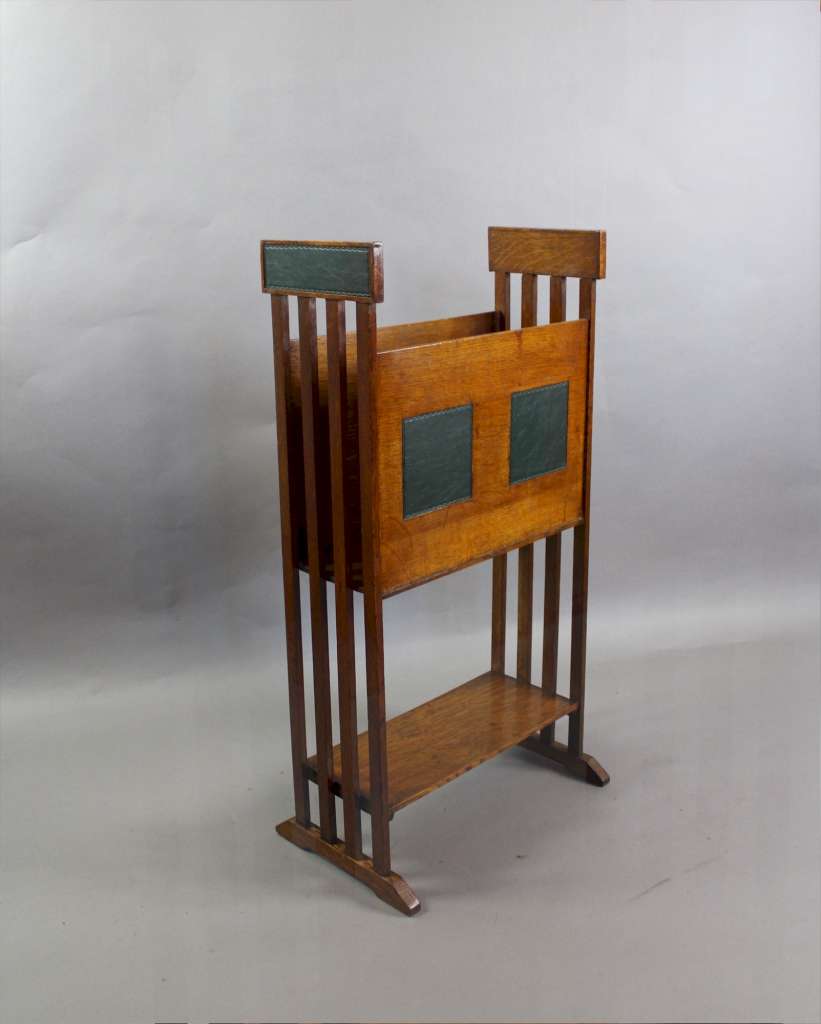 Arts and Crafts oak and leather magazine rack