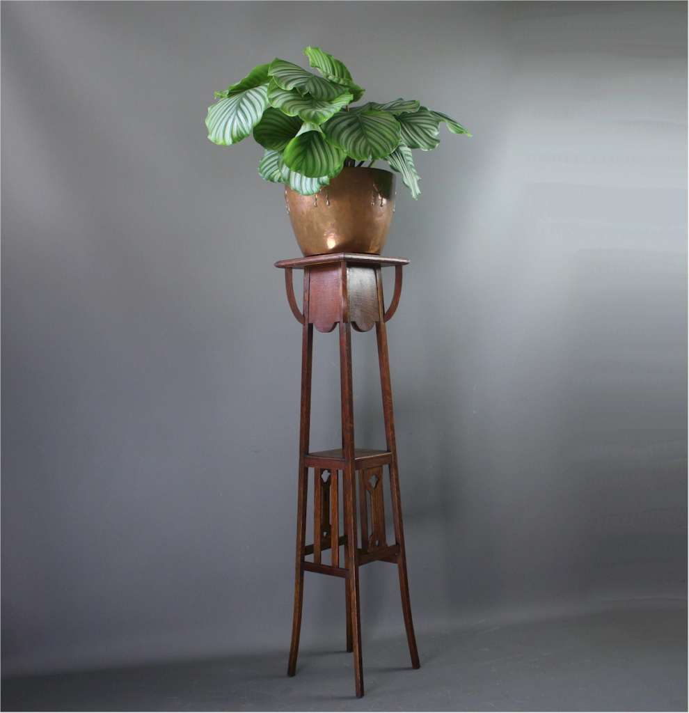 Art Nouveau oak planter with inset green tile