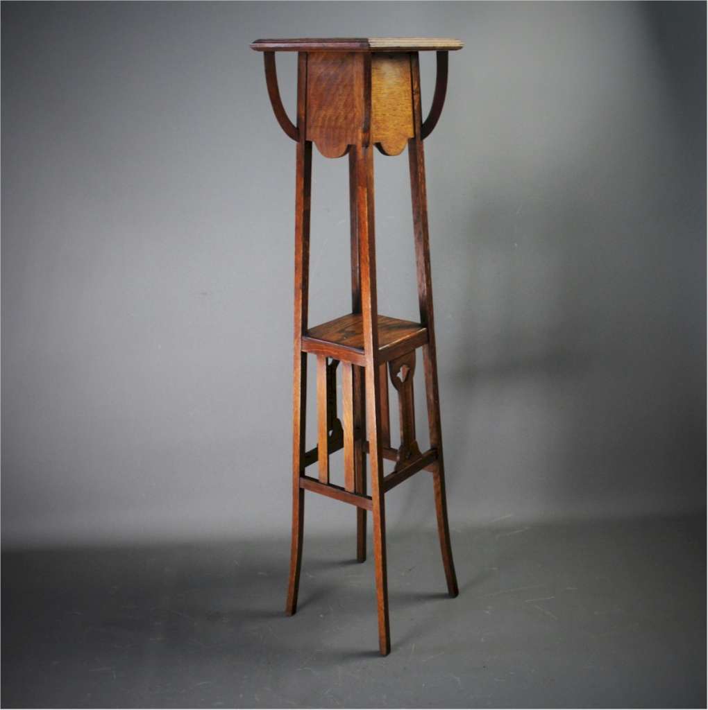 Art Nouveau oak planter with inset green tile