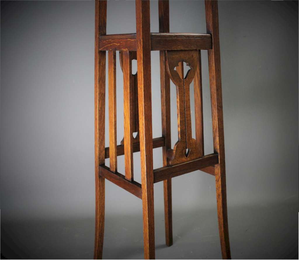 Art Nouveau oak planter with inset green tile