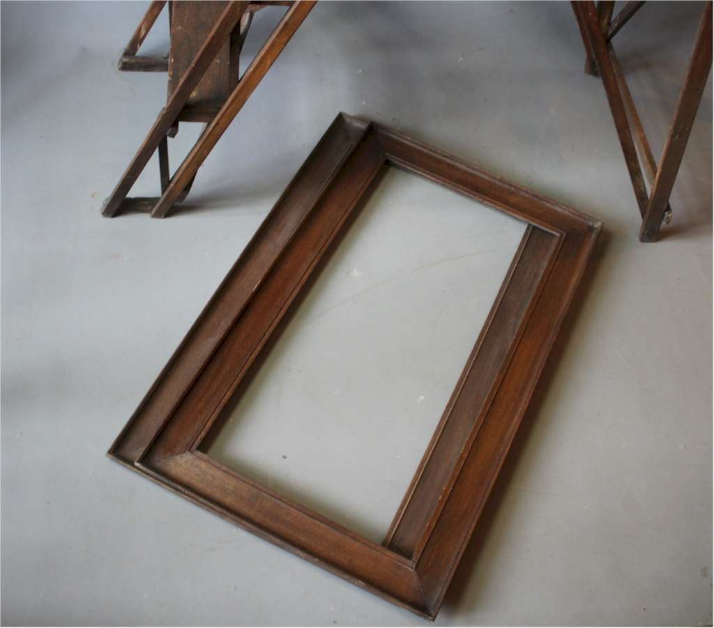 Near pair of Edwardian oak frames.