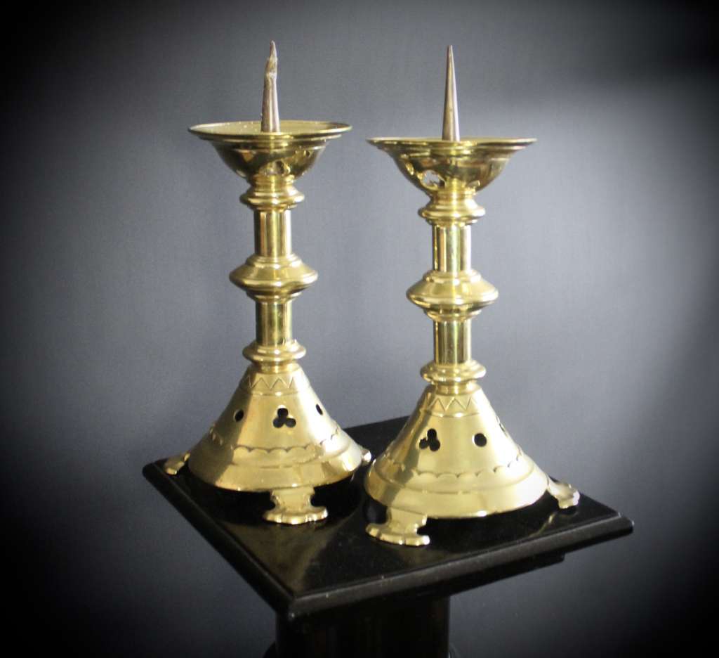 A Pair of Gothic Brass candlesticks
