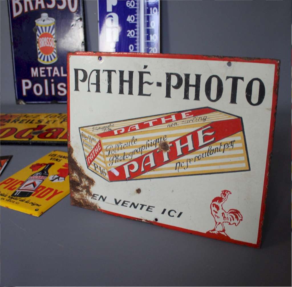 Enamel advertising sign for Pathe film