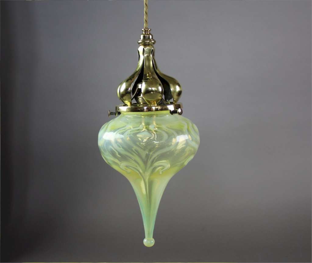 Wonderful arts and crafts brass and Powell shade pendant.