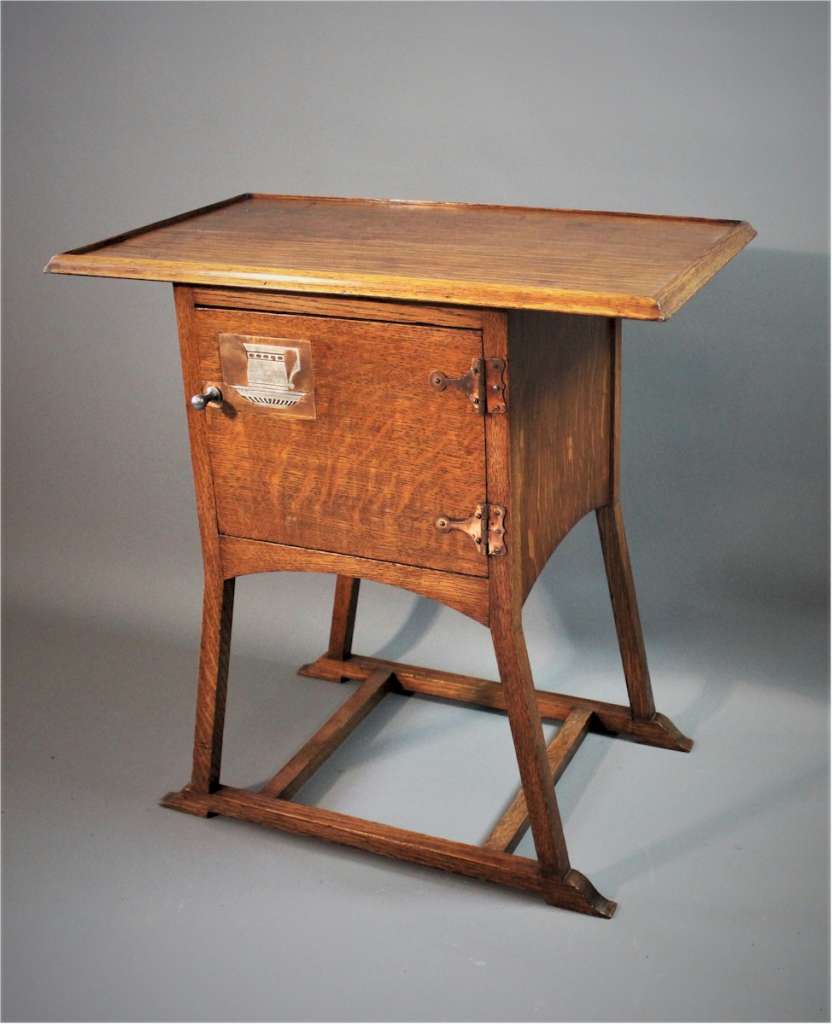 Arts & Crafts bedside or tea table top cabinet. Designed by EG Punnet