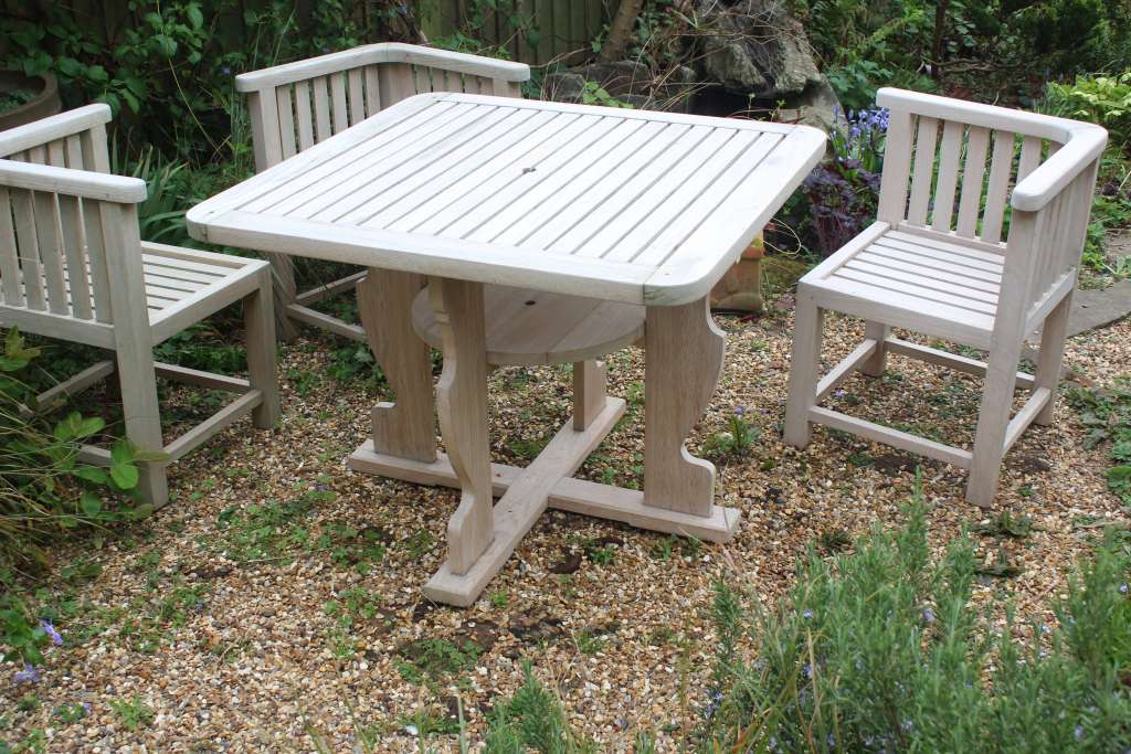  Reclaimed Teak Garden table with four wrap round chairs for Heals
