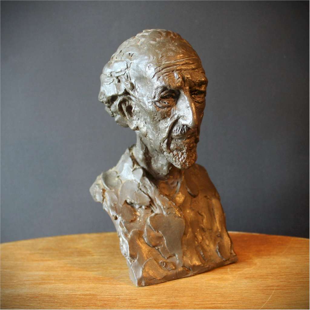  Resin sculpture of an old man's head signed P Jackson