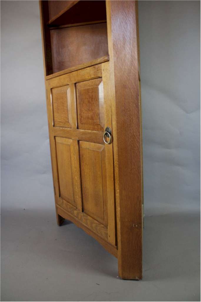 Arts and Crafts corner cupboard by Reynolds in golden oak Art Furniture