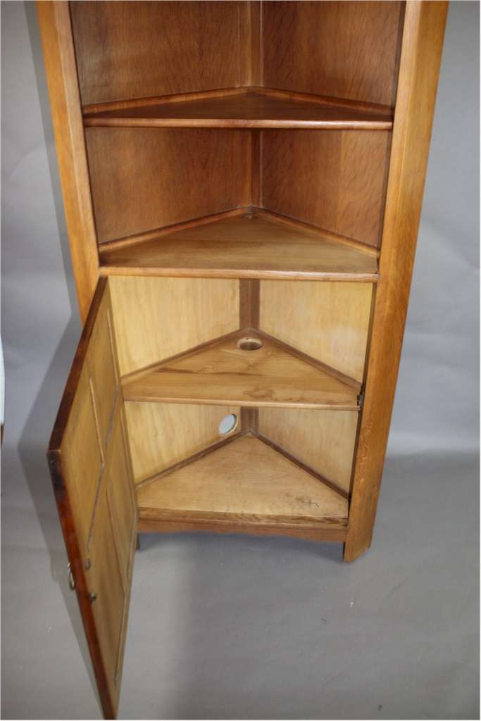 Arts and Crafts corner cupboard by Reynolds in golden oak Art Furniture