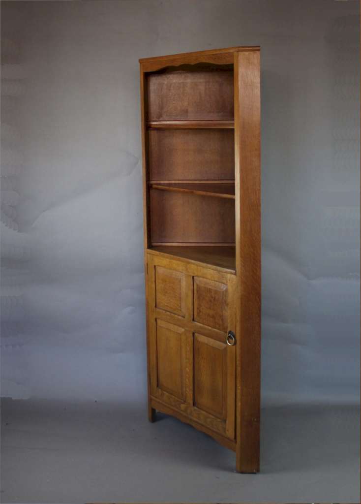 Arts and Crafts corner cupboard by Reynolds in golden oak Art Furniture