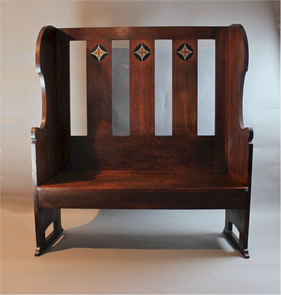 Arts and crafts oak settle with pewter ,ebony and fruitwood inlay c1900