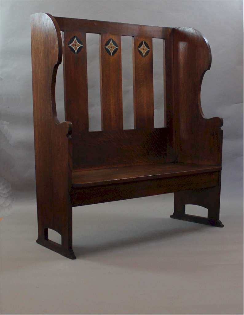Arts and crafts oak settle with pewter ,ebony and fruitwood inlay c1900