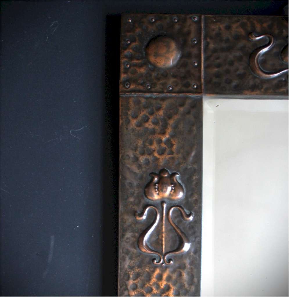 Small arts and crafts wall mirror in copper