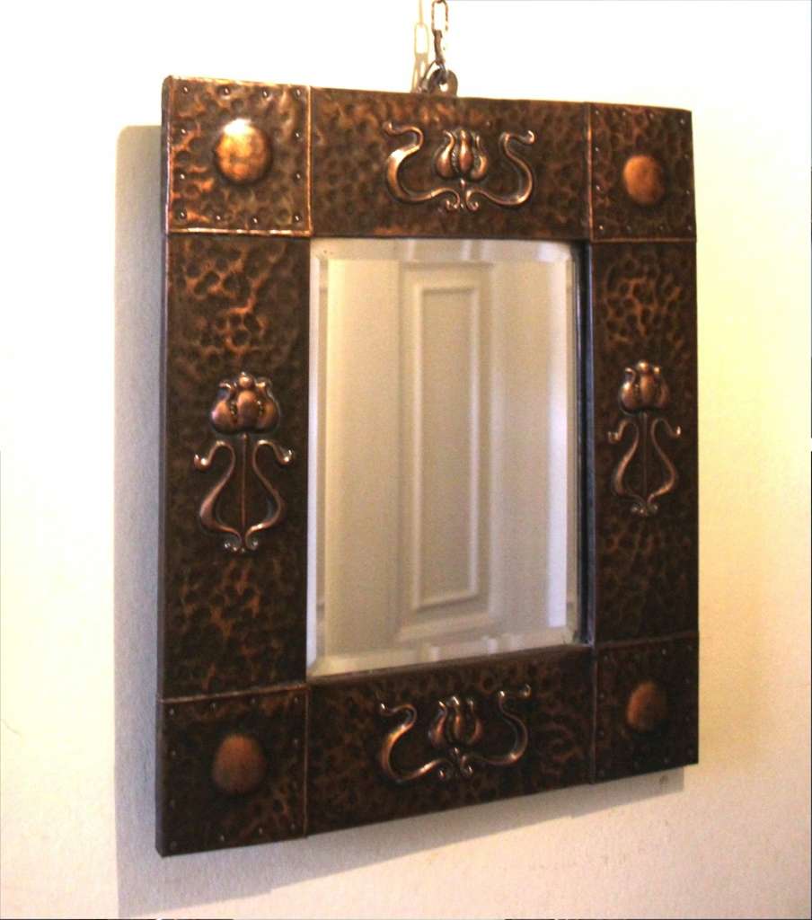 Small arts and crafts wall mirror in copper