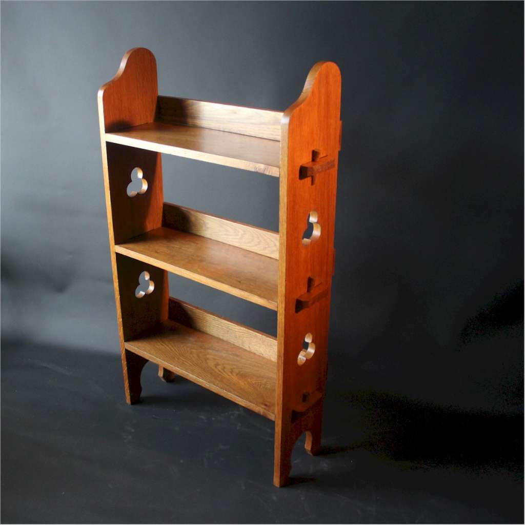 Arts & Crafts oak bookshelf retailed by Liberty & Co as 