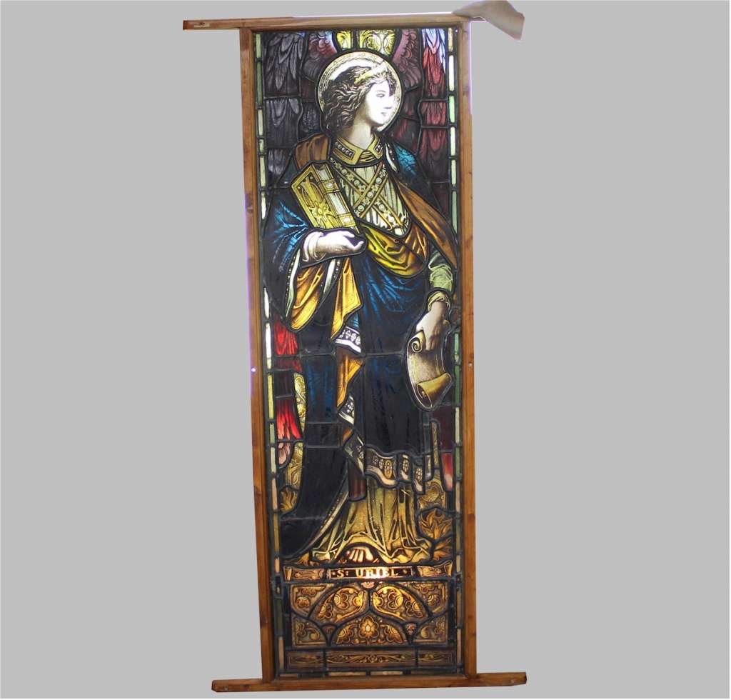 Victorian pre-raphaelite stained glass angel.