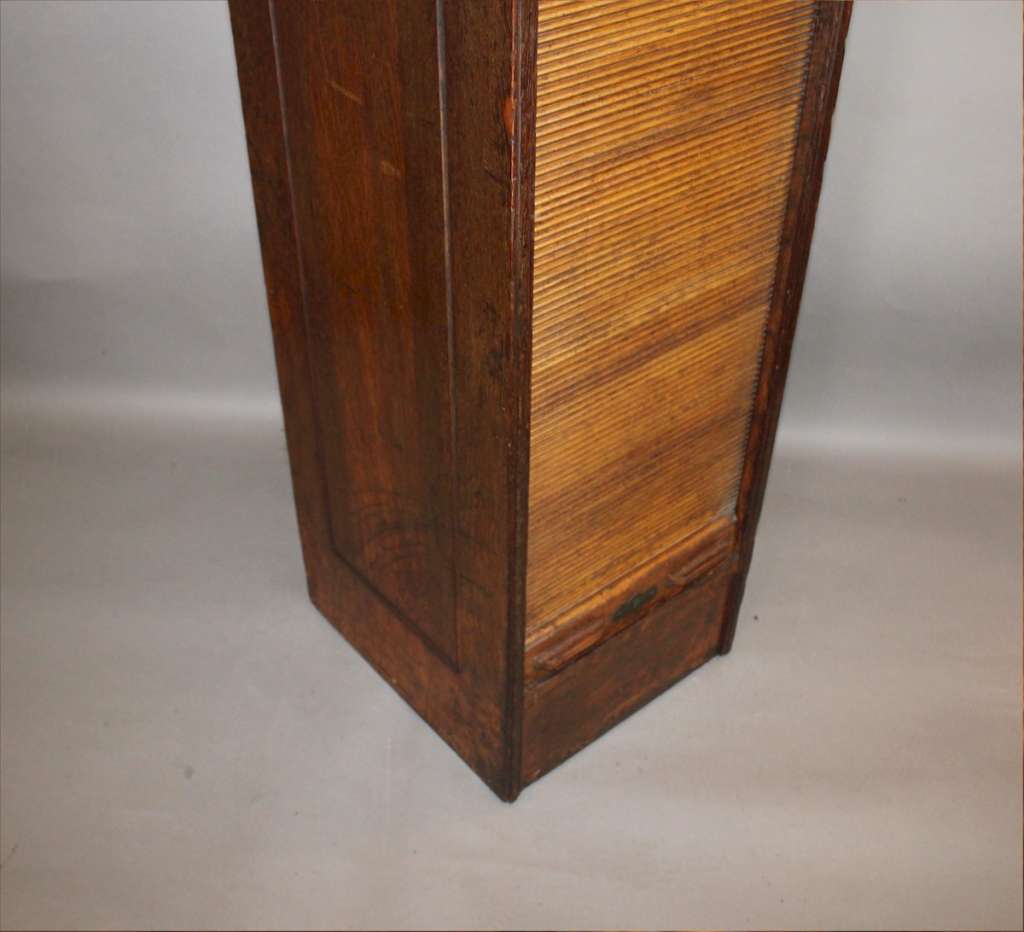 Tall oak filing cabinet by Globe c1897