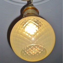 Vaseline glass hall light with brass fittings