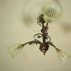 Arts and crafts three branch ceiling light in iron and copper