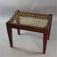 Irish Arts and Crafts mahogany stool with leather straps