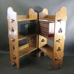 A Pair of Arts and Crafts oak open bookshelves, 
