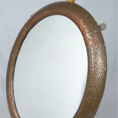 Small arts and crafts wall mirror in copper