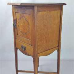 Arts and crafts inlaid cabinet in golden oak