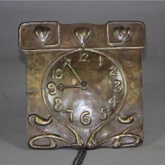 Brass arts and crafts wall clock c1900