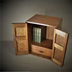 Arts and Crafts Cotswold School table top cabinet.