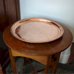 Large copper arts and crafts charger by Hugh Wallis