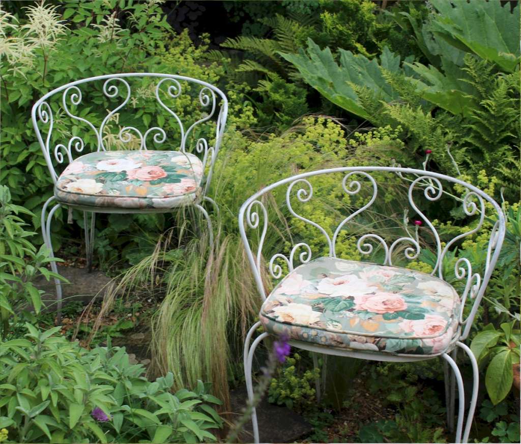 Pair of decorative metal garden chairs